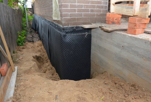 Happy homeowners after waterproofing job in Eland